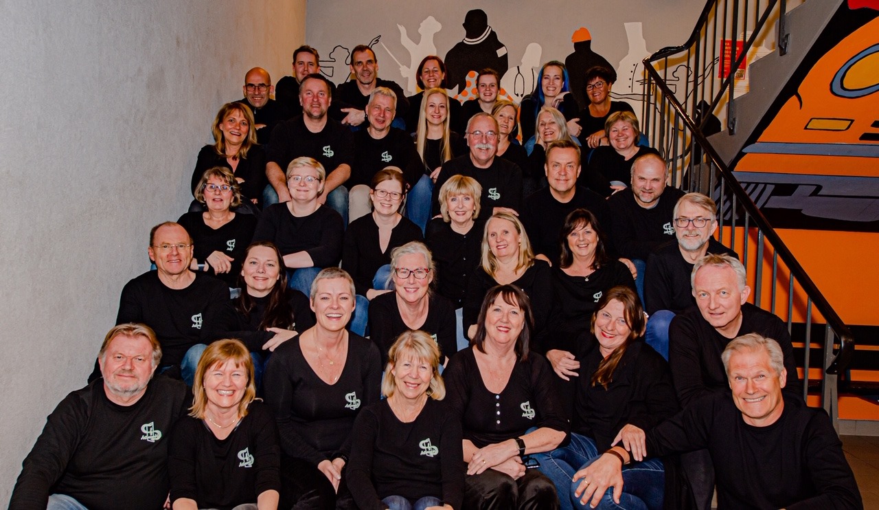 ÅsEnsemblet synger under åpningen. Foto: Privat. 